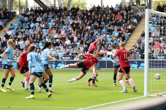 Manchester City v Manchester United - The Adobe Women's FA Cup Semi Final MANCHESTER, ENGLAND - APRIL 13: Grace Clinton of Manchester United scores her team's second goal during The Adobe Women's FA Cup Semi Final match between Manchester City and Manchester United at Joie Stadium on April 13, 2025 in Manchester, England.