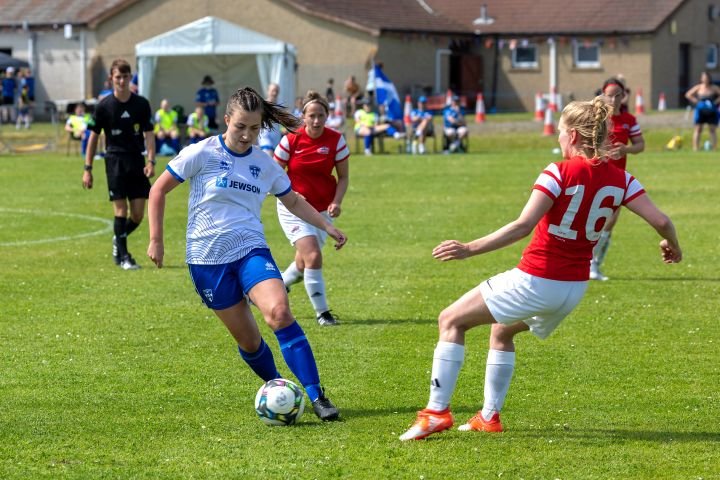 Shetland Tahlia Leslie vs Hitra at Island Games 2025 womensfootballmagazinecom Nairn Set for Historic Highlands and Islands Womens Final