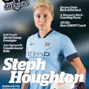 sk22jpg womensfootballmagazinecom Front cover of a womens football magazine showing a female player in a light blue jersey holding a soccer ball with bold white title text and cover lines about coaching and players Issue date visible in the corner